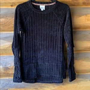 Black sweater with lace detailed sleeves